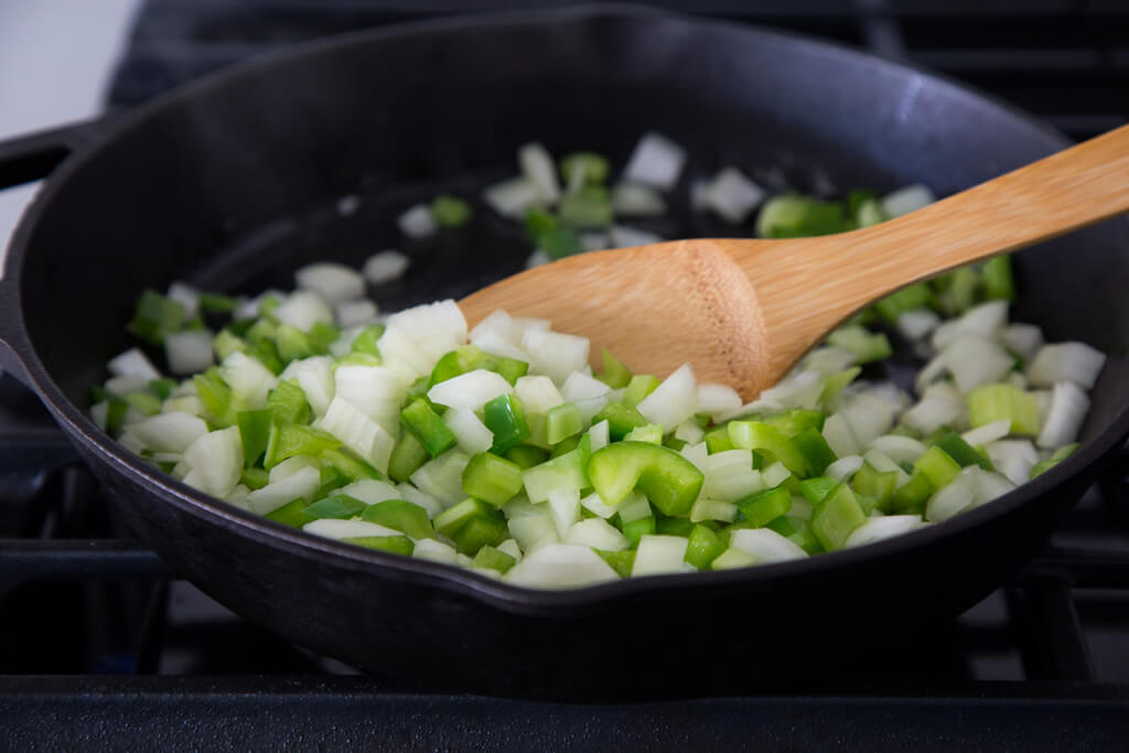 Onions, celery, and bell pepper create The Cajun Holy Trinity used in a variety of Cajun recipes. Find out more at onions-usa.org.