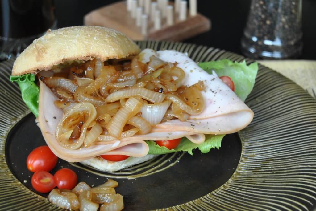 Roast Turkey and Caramelized Balsamic Onions sandwich photo.