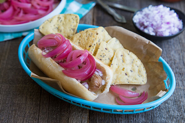 PIckled onion on hotdog