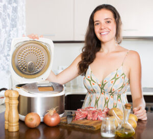 Woman in kitchen with Instant Pot