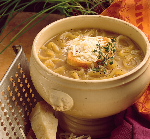 Onion soup in a beige crock 